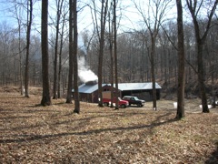 Smoke rises from syrup house